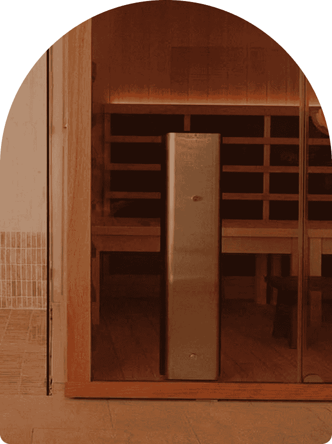 Infrared sauna interior featuring wooden benches and a sleek stainless steel heater, promoting relaxation and wellness at Wellness on Darling, Balmain.